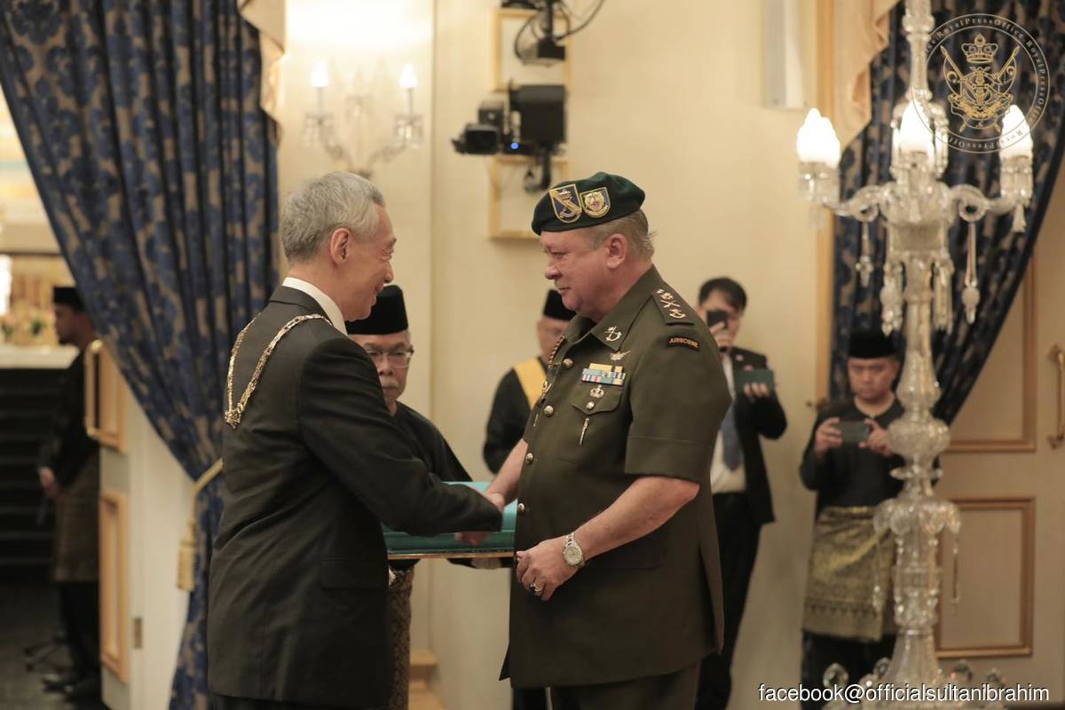Sultan Ibrahim (right) said the conferment of the state’s highest award on Lee was a testimony of the long-standing close and strong relations between the two neighbours.